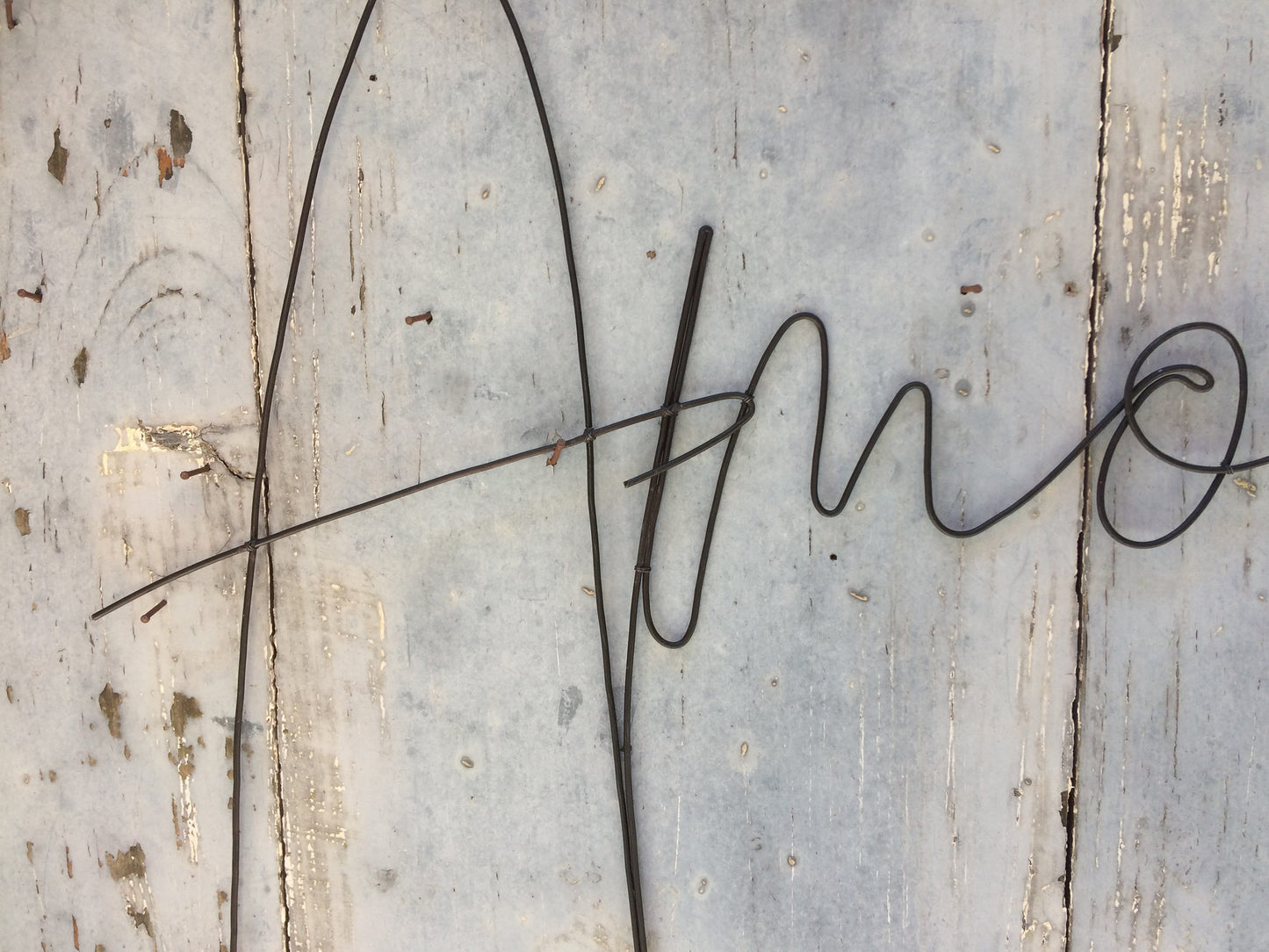 Word Love in annealed wire, wall decoration