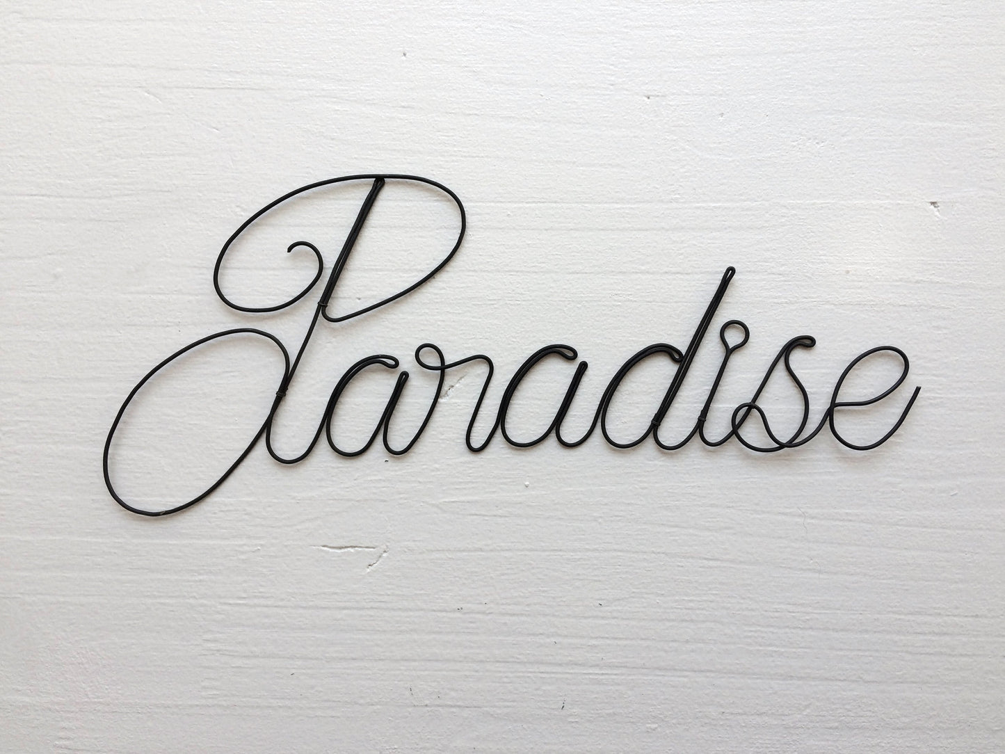 Paradise door plaque in annealed wire, word in wire, message, sentence, writing, quote, sculpture in annealed wire