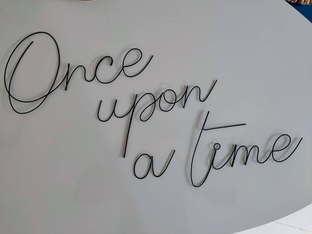 Phrase Once upon a time in annealed wire, writing, wire message, wire phrase, wire quote, wire wall decor